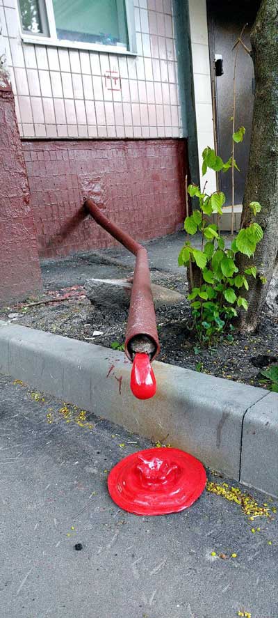 Artwork showing blood pouring from a drain pipe