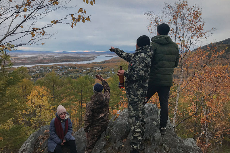 Young people gather on Torch Hill.