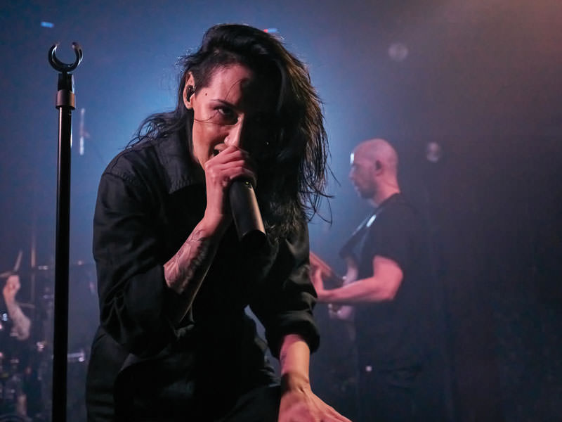 Woman singing on stage