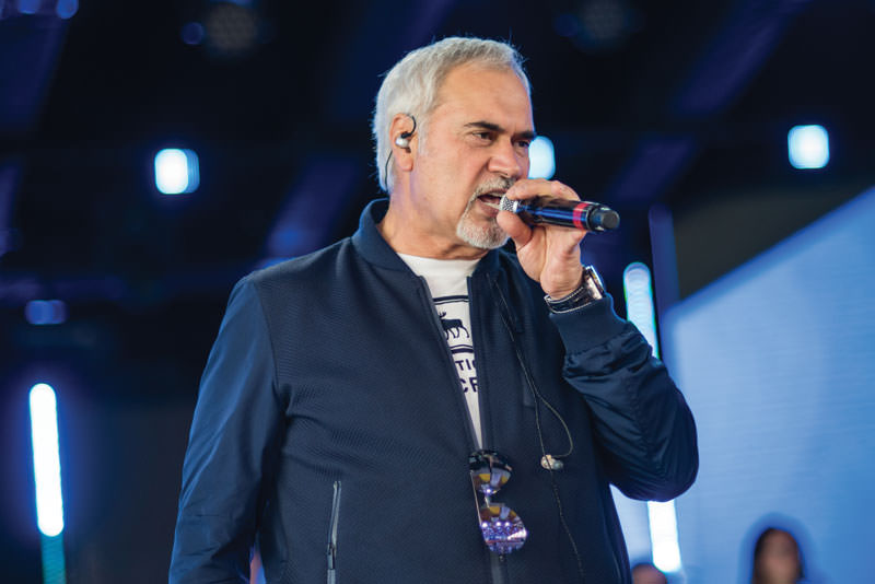 Man singing on stage.