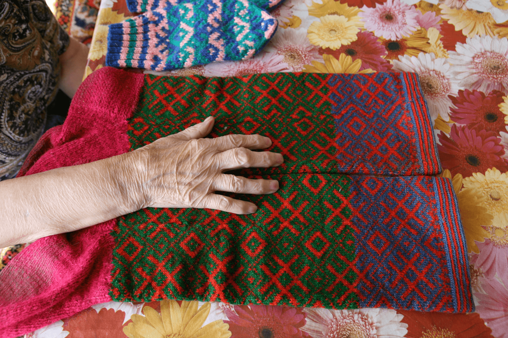 Elderly hand on knitting