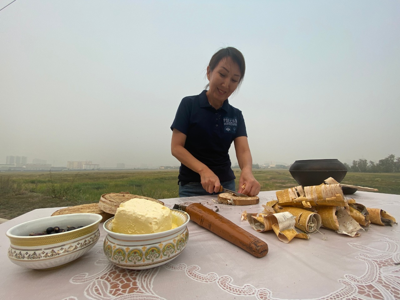 Tuyara cooking outdoors