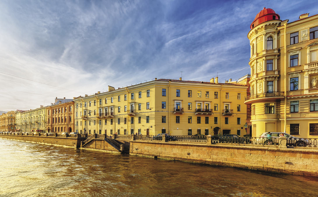 Yellow buildings along a canal.