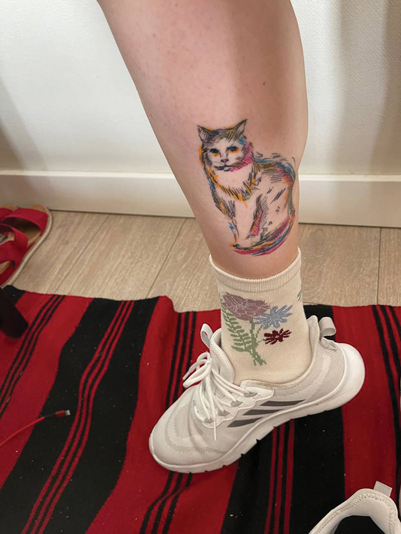 Tattoo on leg.