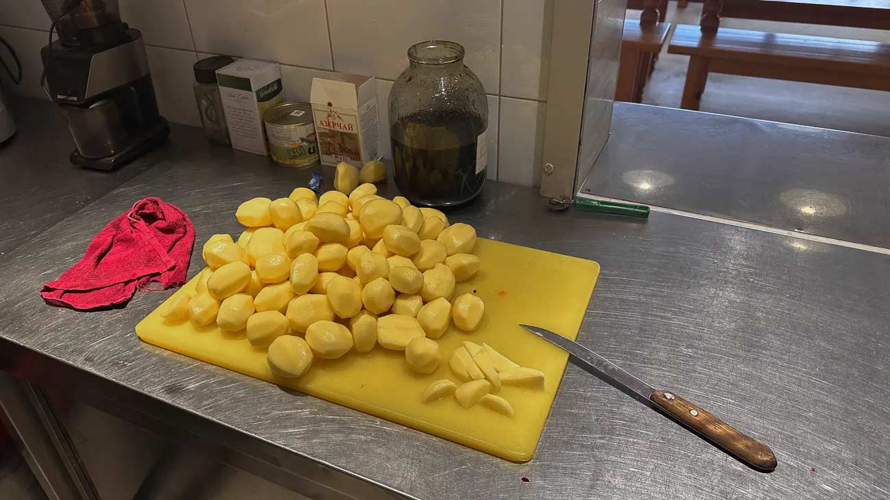 Potatoes on a cutting board.