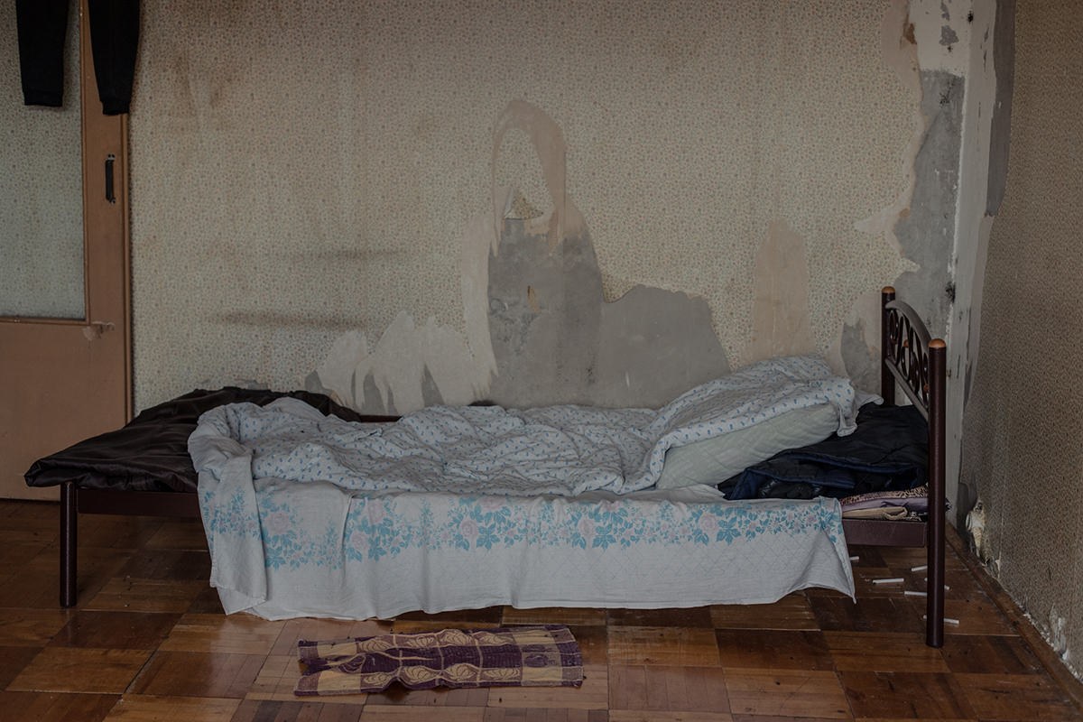 Bed in an apartment.