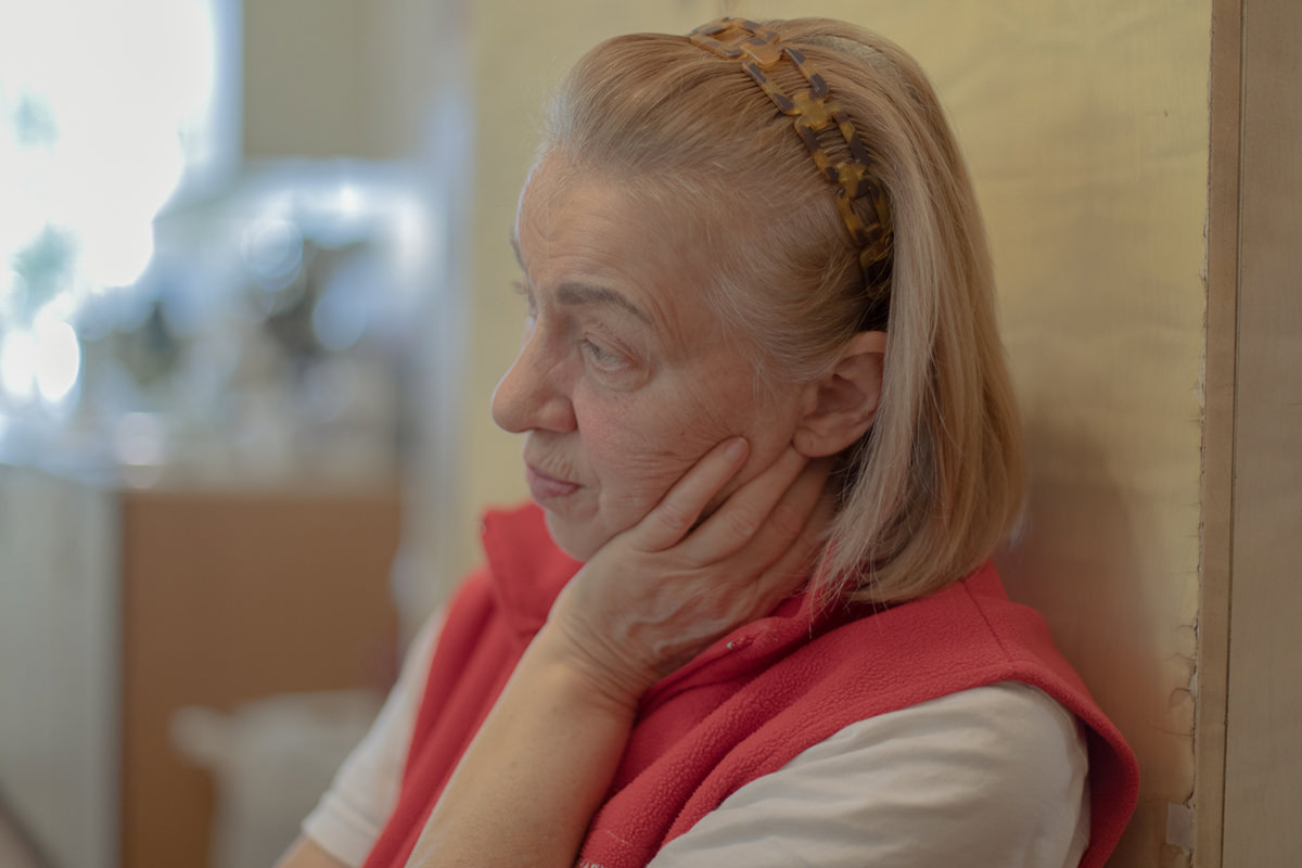 Woman staring off into space.