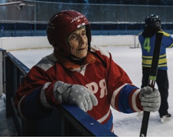 Lady With A Puck