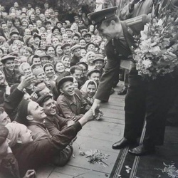 Gagarin visiting a factory in 1961.