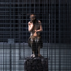 Behind the cage